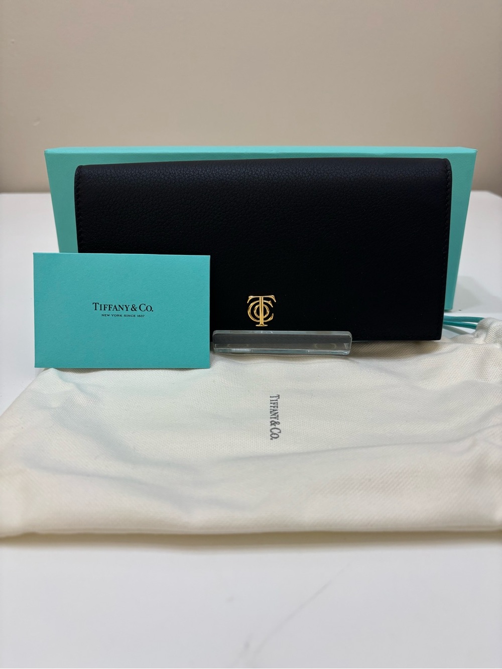 Tiffany & Co. T&CO. Flap Continental Wallet | Black Pebbled Leather